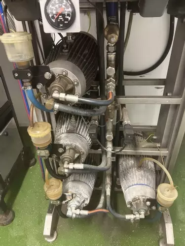 Close-up of Delta Booster pump assembly before servicing in Brownhills, with all pump units ready to be serviced